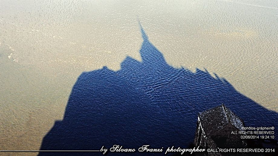 Reflected shadows from Le Mont Saint Michel.